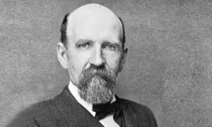 Porträt von Joshua Slocum, dem ersten Einhandsegler, mit Bart und Anzug.