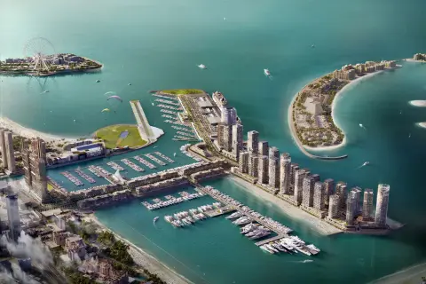 Luftaufnahme des Dubai Port mit Yachten, Hochhäusern, einer Promenade und einem Riesenrad.